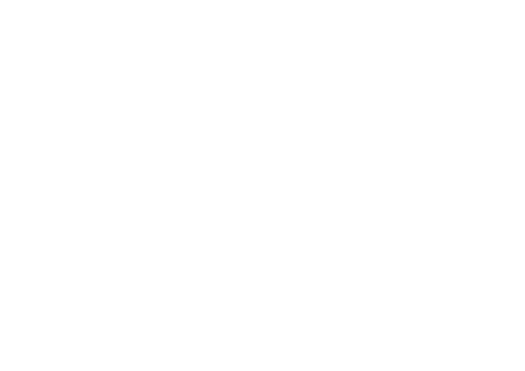 Three tall flagpoles with guy wires against a green background.